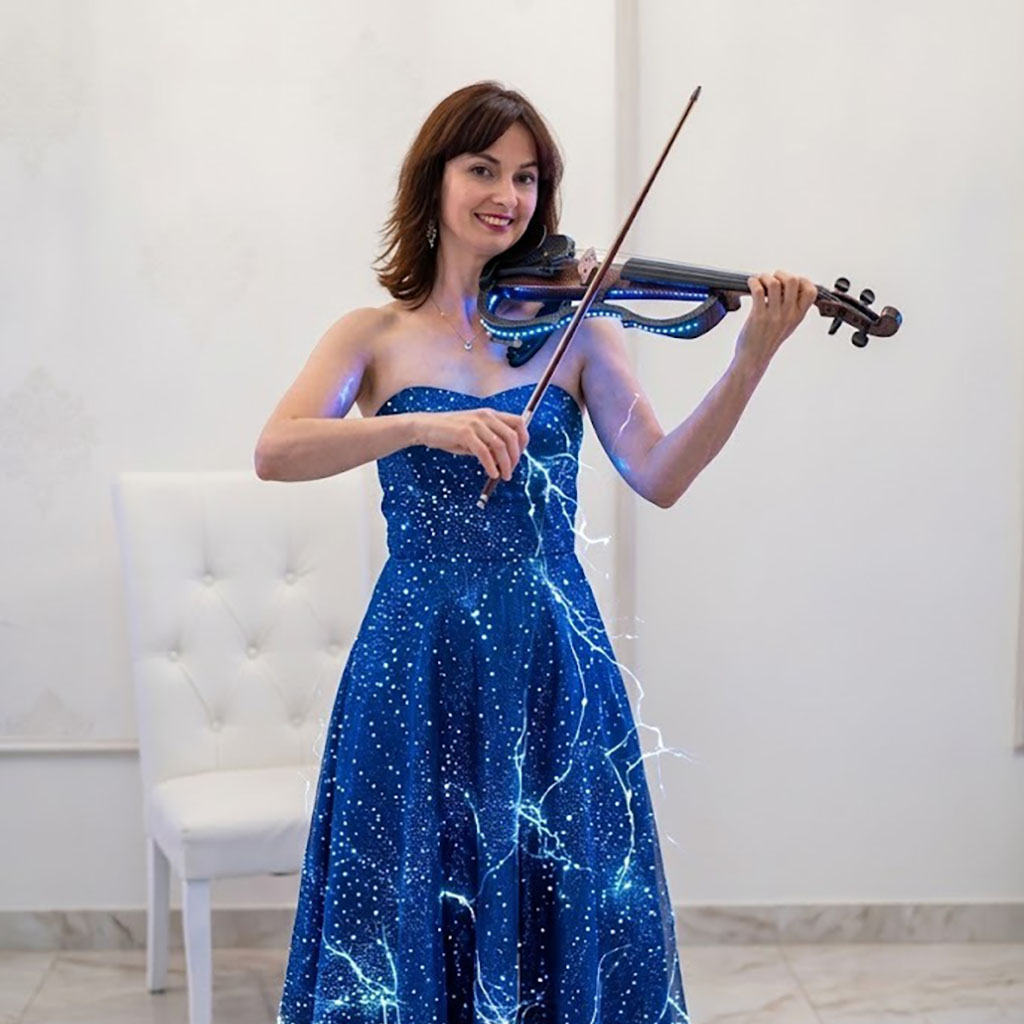 Professional female violinist performing in a blue gala dress for event entertainment in Sydney.