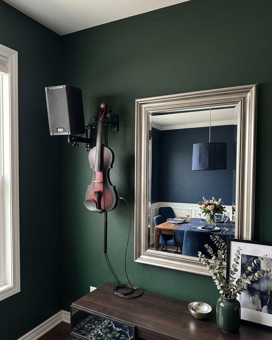 Solo electric violinist for events in Sydney, featuring a red and black Yamaha electric violin on a wall-mounted stand.