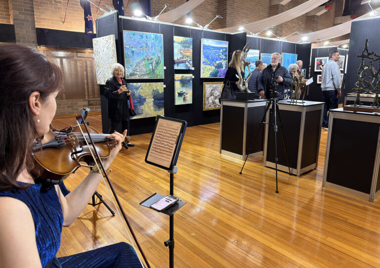 Luminous Strings live performance at a corporate event and art exhibition.