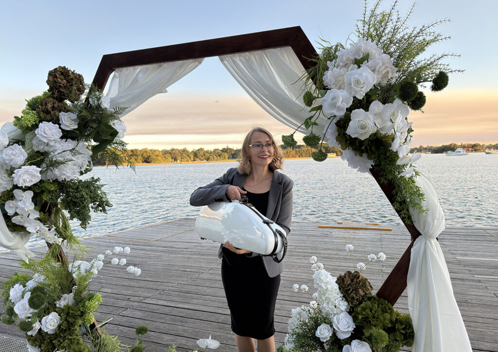 Professional solo violinist performing at an outdoor wedding ceremony in Sydney.