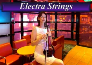 Professional female violinist from Electra Strings performing in a vibrant modern lounge setting.