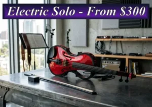 A sleek red electric violin on a modern workbench, representing solo electric violin performances in Sydney starting from $300.