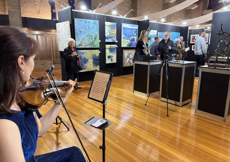 Luminous Strings live performance at a corporate event and art exhibition.